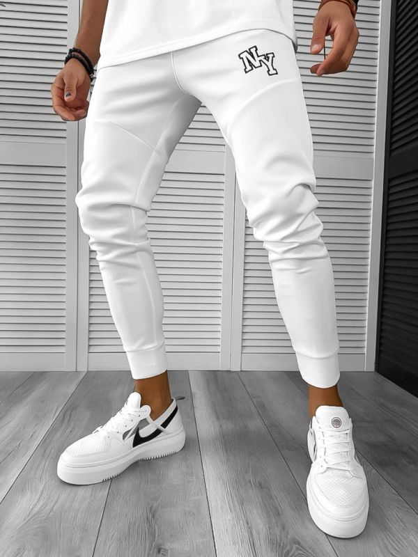 Pantaloni de trening albi, conici, silon cu mic defect 12347 O2-5.1