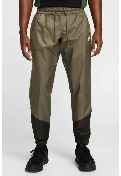 Pantaloni cu slituri cu fermoar la glezna Windrunner - Negru/Verde masliniu