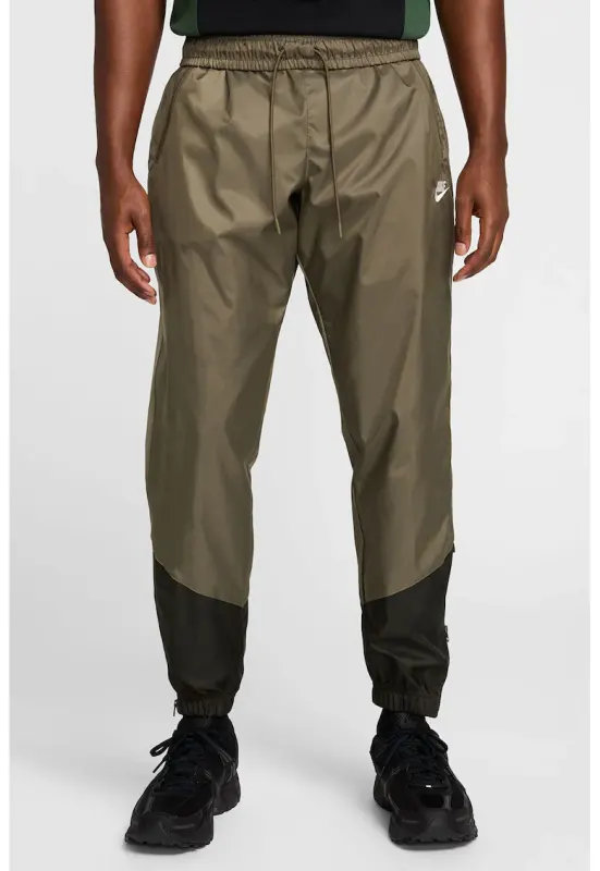 Pantaloni cu slituri cu fermoar la glezna Windrunner - Negru/Verde masliniu