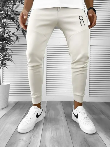 Pantaloni de trening bej conici 12260