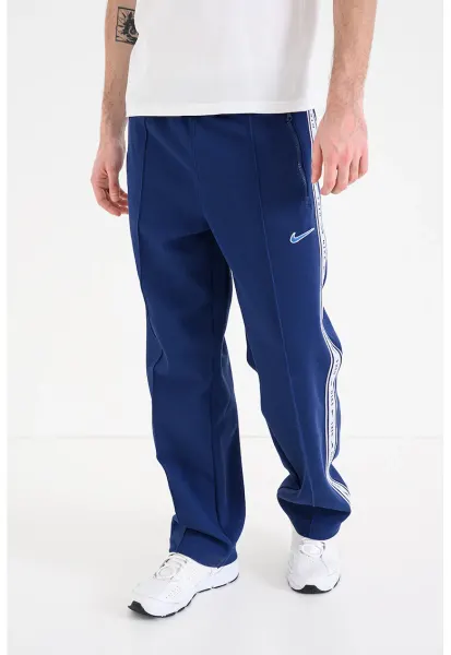 Pantaloni de trening cu banda logo si buzunare cu fermoar - Bleumarin