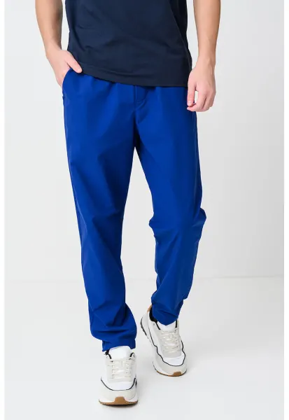 Pantaloni de trening cu buzunare laterale si model uni - Albastru royal