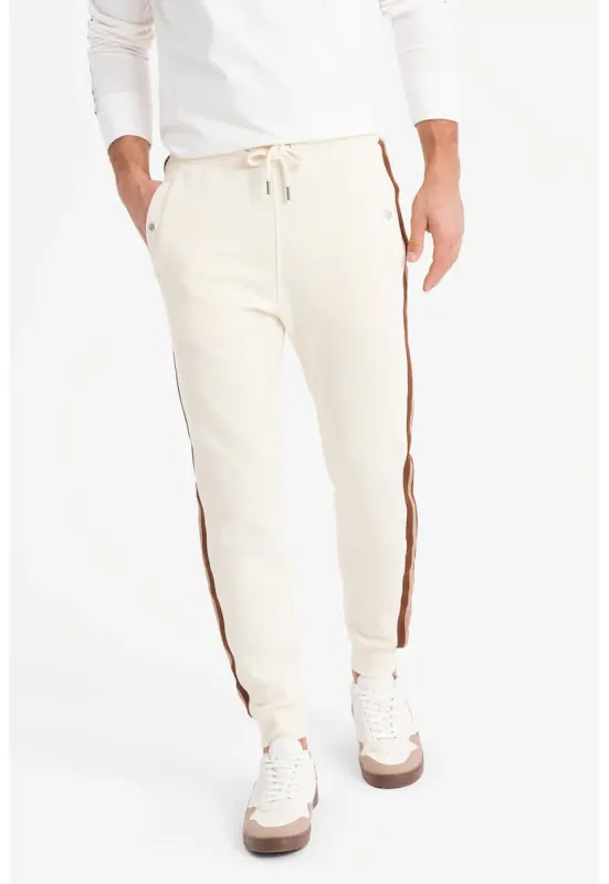 Pantaloni de trening cu croiala conica si segmente laterale contrastante - Maro/Crem