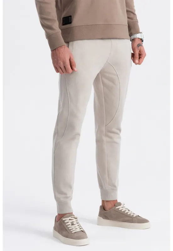 Pantaloni de trening cu croiala conica si snur de ajustare - Grej