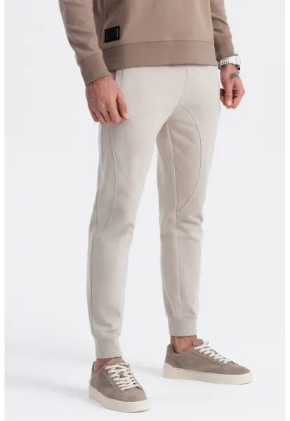 Pantaloni de trening cu croiala conica si snur de ajustare - Grej