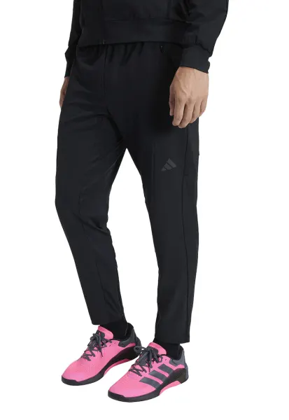 Pantaloni de trening cu croiala regular fit si logo - pentru fitness Hybrid - Negru