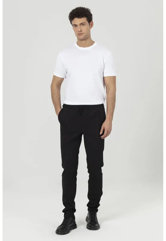 Pantaloni de trening cu croiala regular-fit si model uni - Negru