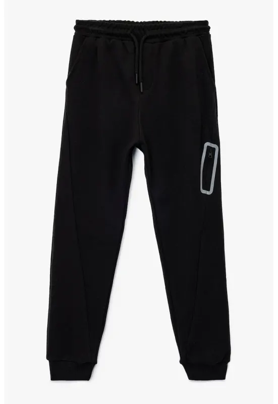 Pantaloni de trening din bumbac cu buzunar cu fermoar - Negru