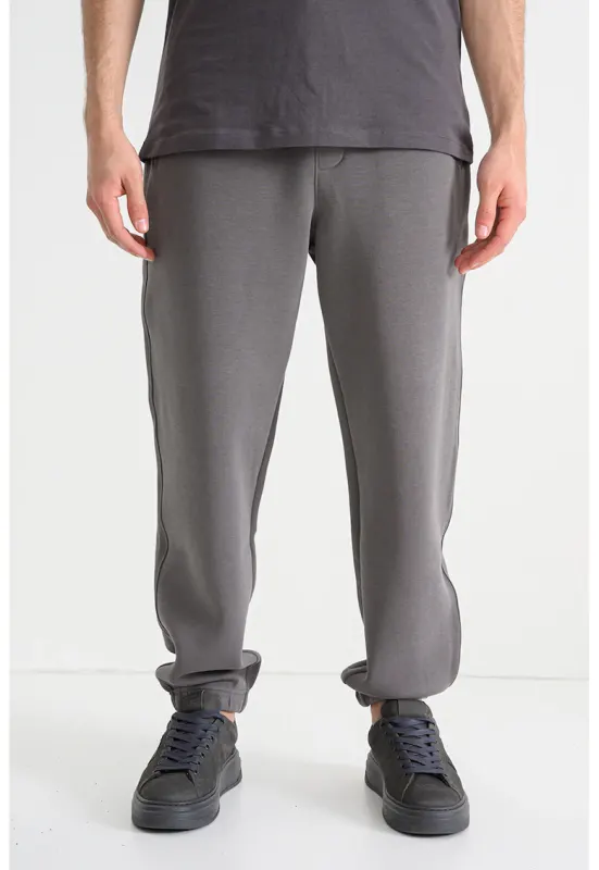 Pantaloni relaxed fit de trening cu snur in talie - Gri inchis