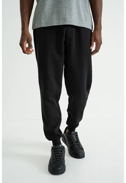 Pantaloni uni de trening din amestec de bumbac - Negru